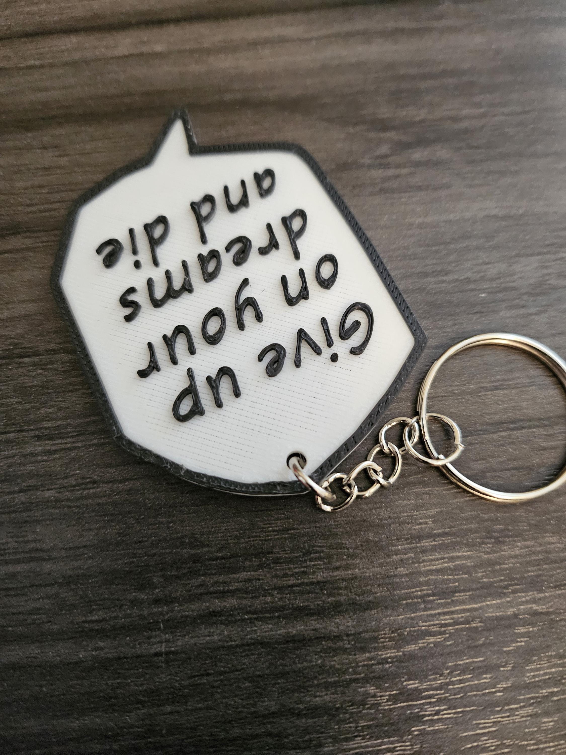 Attack on Titan Levi Manga - Give Up On Your Dreams and Die Speech Bubble Key Chain (etsy image id: 6323266811)