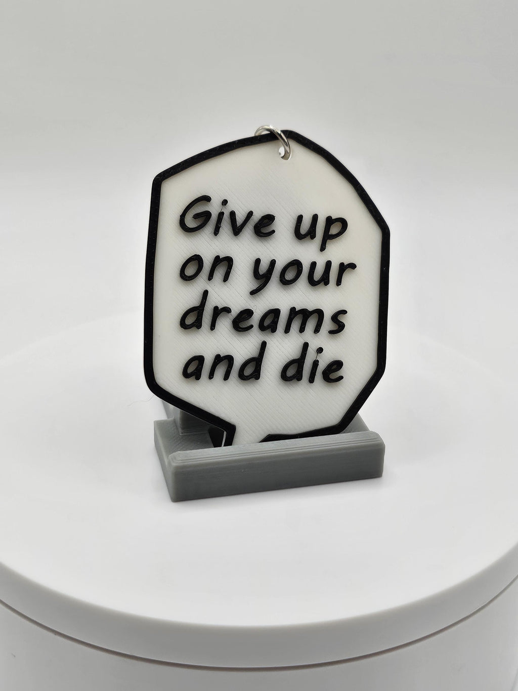 Attack on Titan Levi Manga - Give Up On Your Dreams and Die Speech Bubble Key Chain (etsy image id: 6596227471)